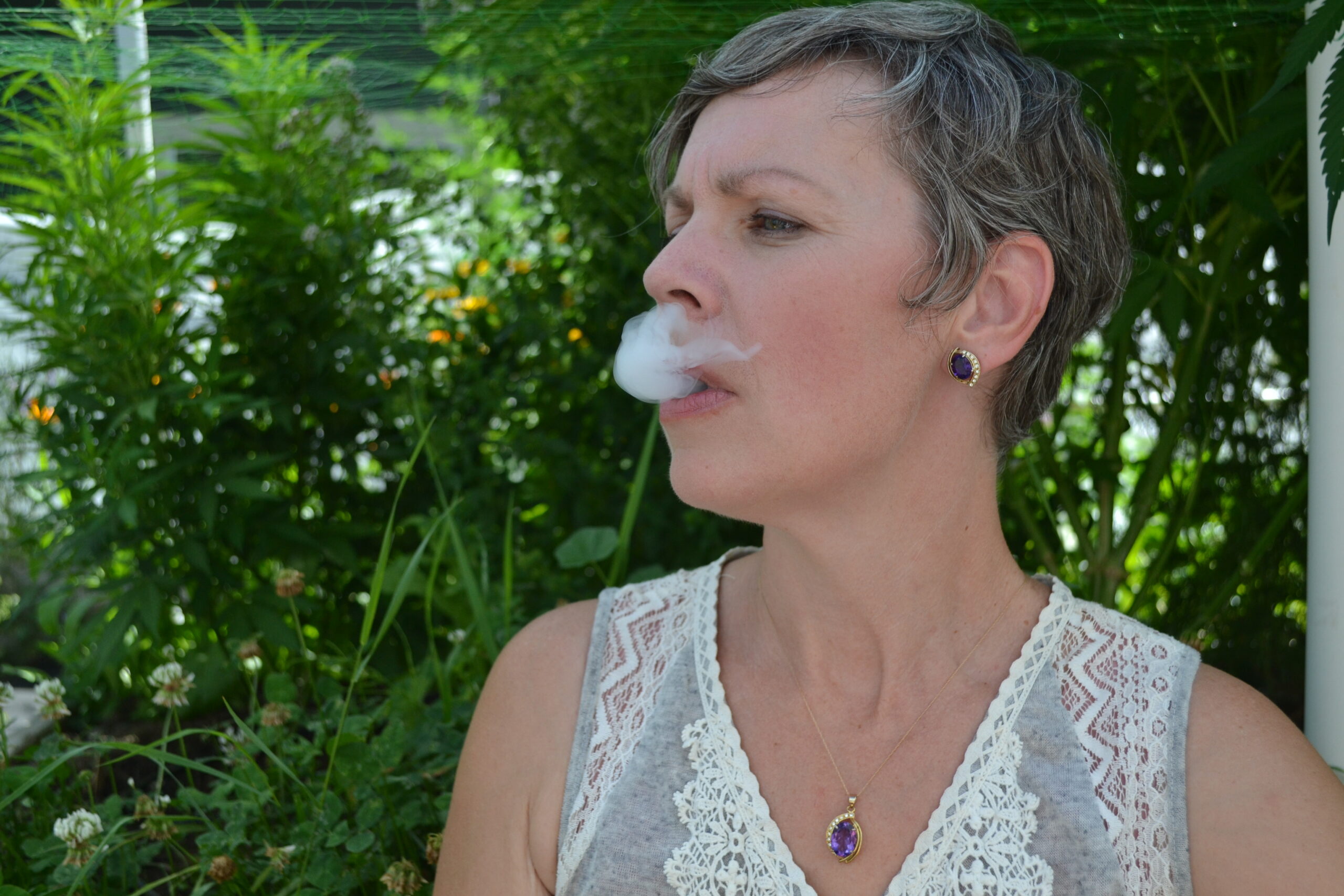 DSC_0087 puff of smoke coming out of womans mouth